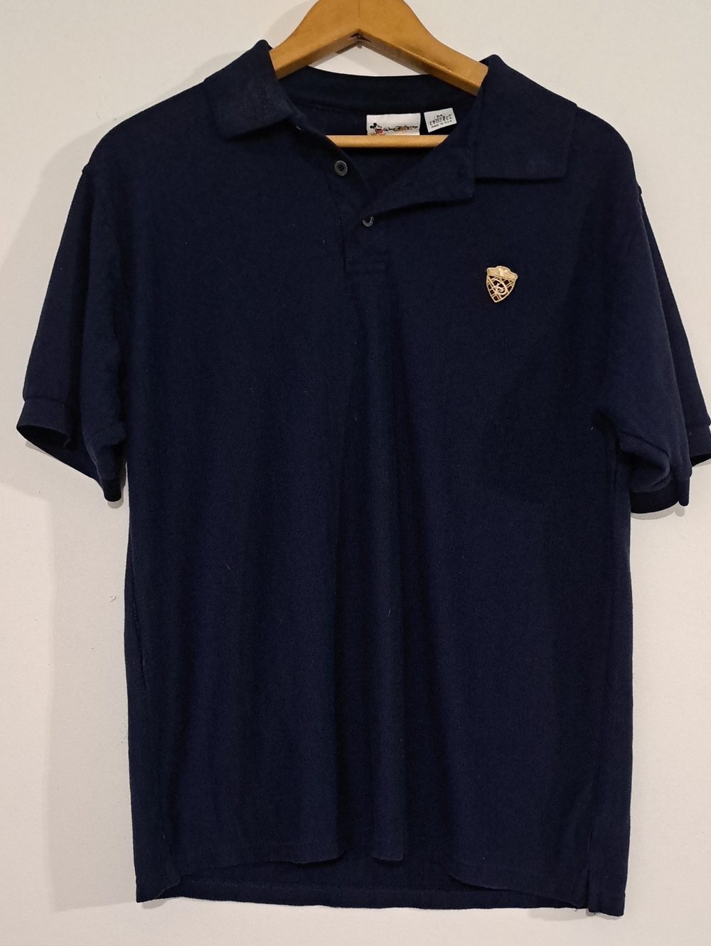 Disney Men's Navy Polo with Gold Crest Emblem